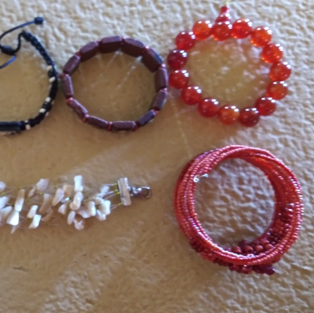 Orange and red beaded bracelets